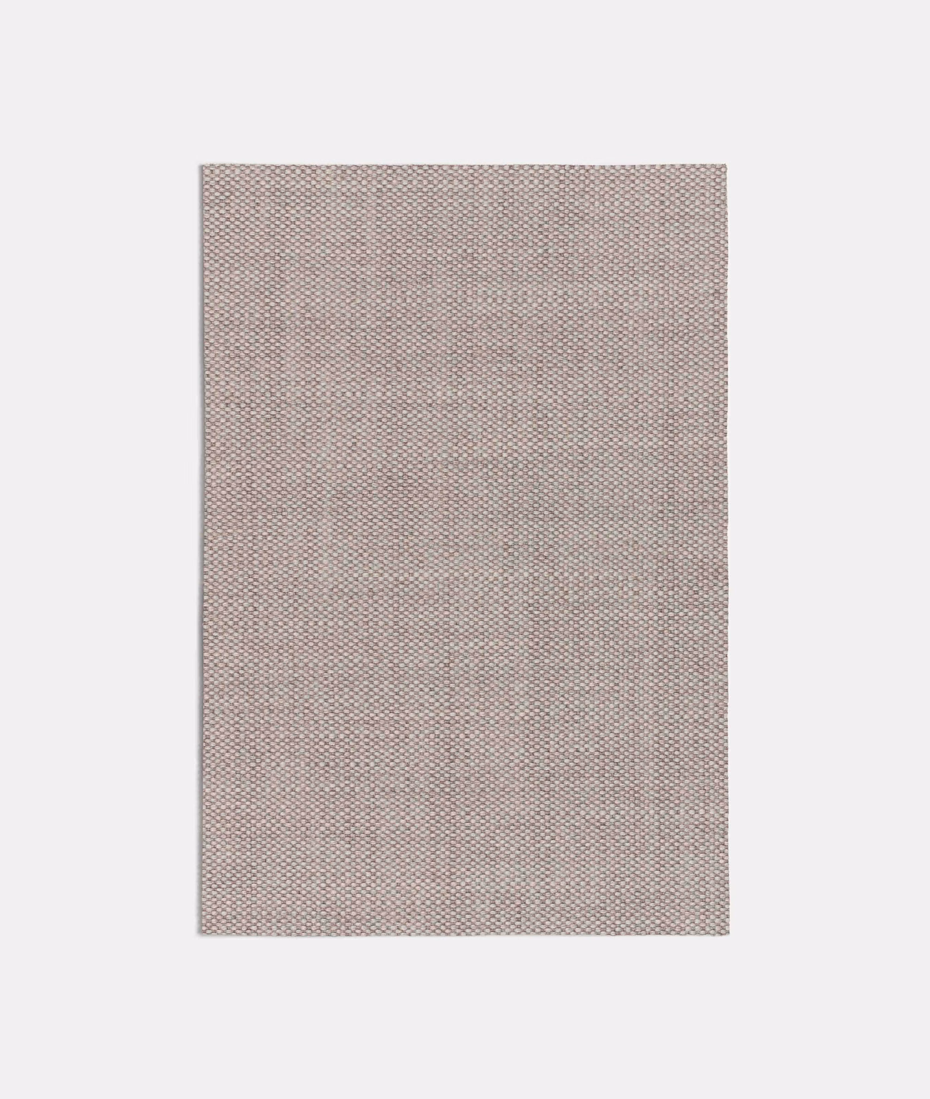 Soft pink taupe fabric with a densely woven micro-check and subtly mottled texture
