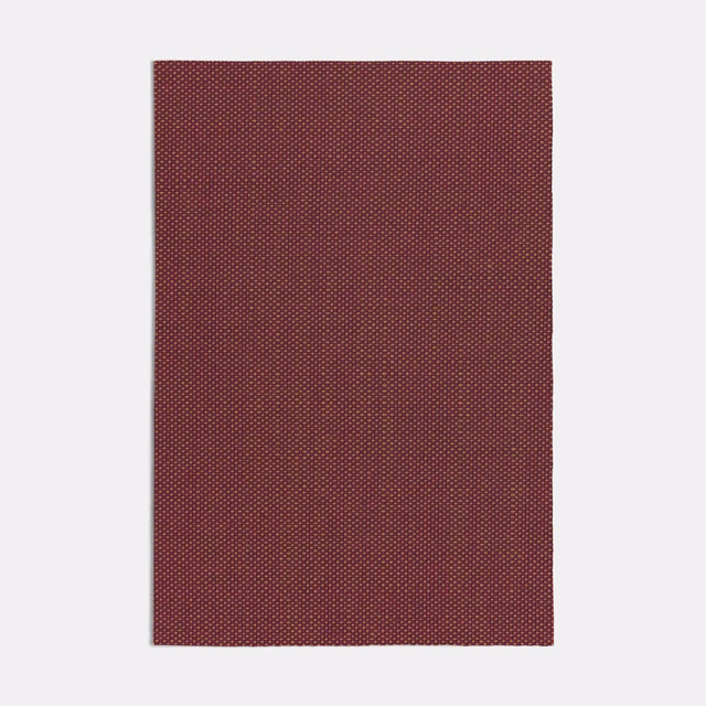 Deep terracotta-red woven swatch with a fine, regular micro-pattern and subtle texture