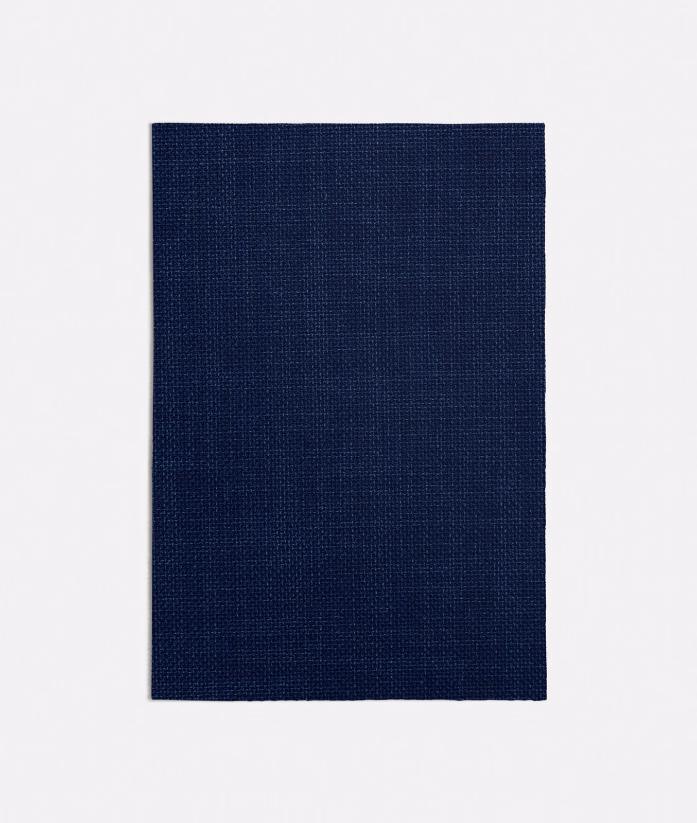 Deep navy blue textile swatch showing a fine, close woven crosshatch texture
