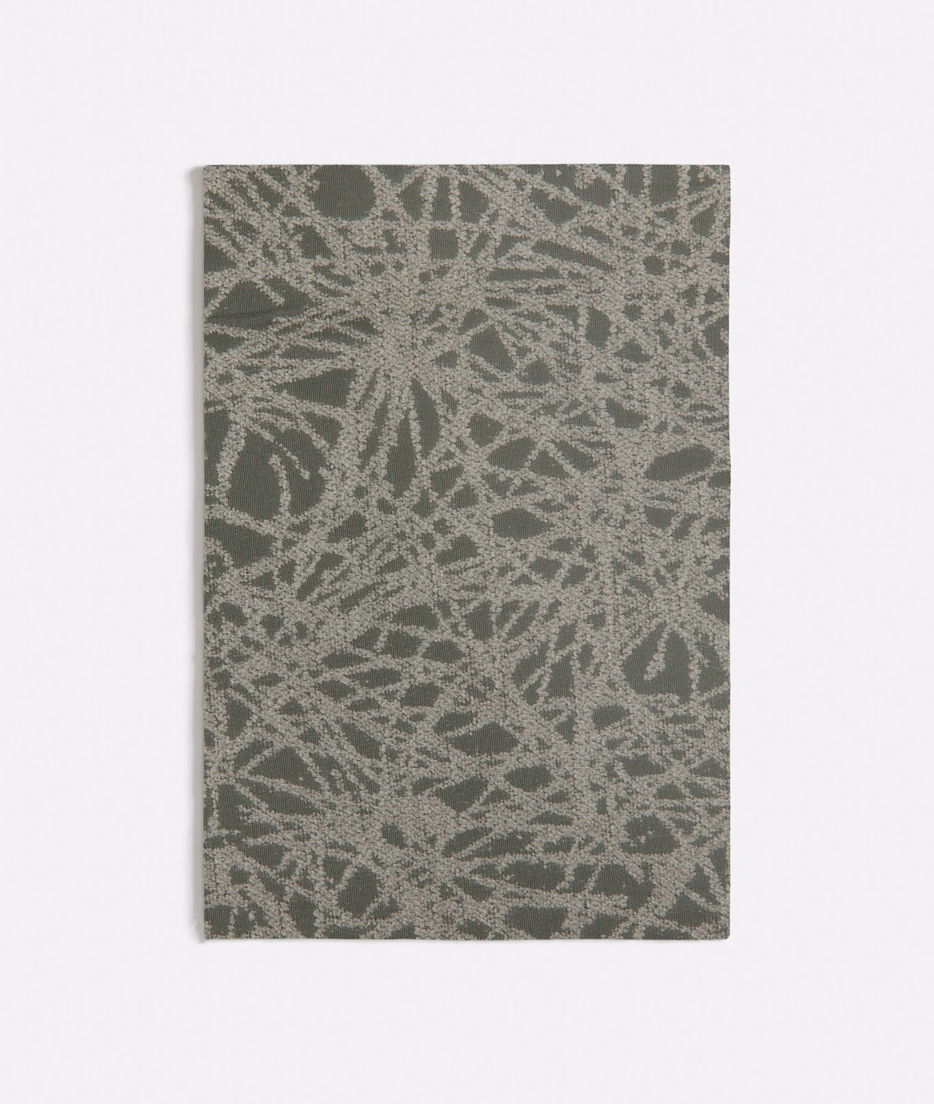 Muted olive-green weave with pale grey looping botanical marks across the swatch