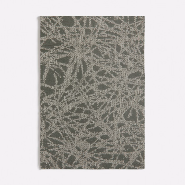 Muted olive-green weave with pale grey looping botanical marks across the swatch