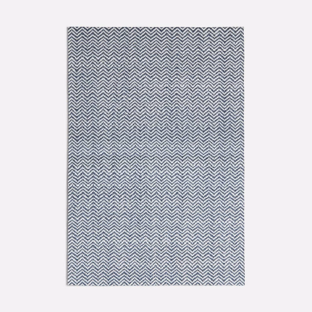 Cool blue-grey and ivory micro-chevron weave in a dense zigzag field