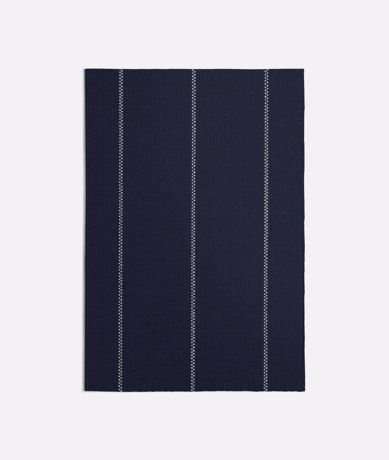 Dark Strasse Blue woven fabric with fine vertical dotted pale stripes