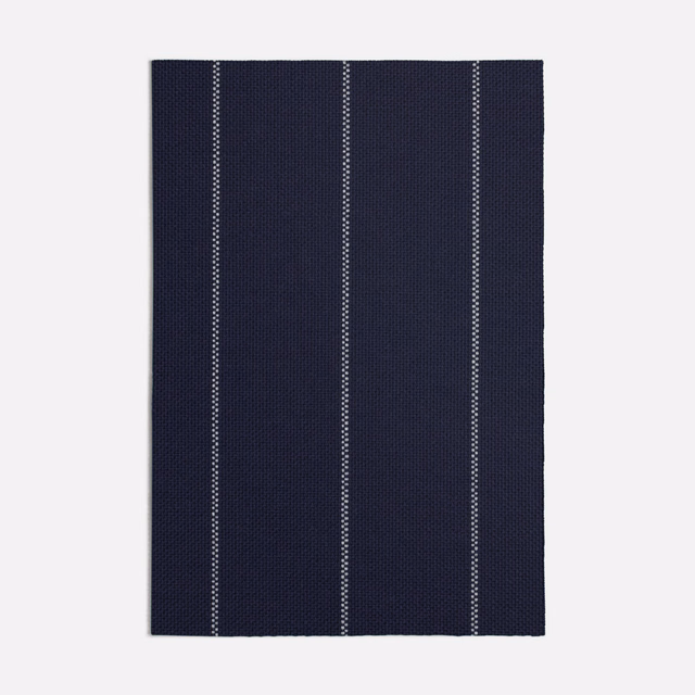 Dark Strasse Blue woven fabric with fine vertical dotted pale stripes