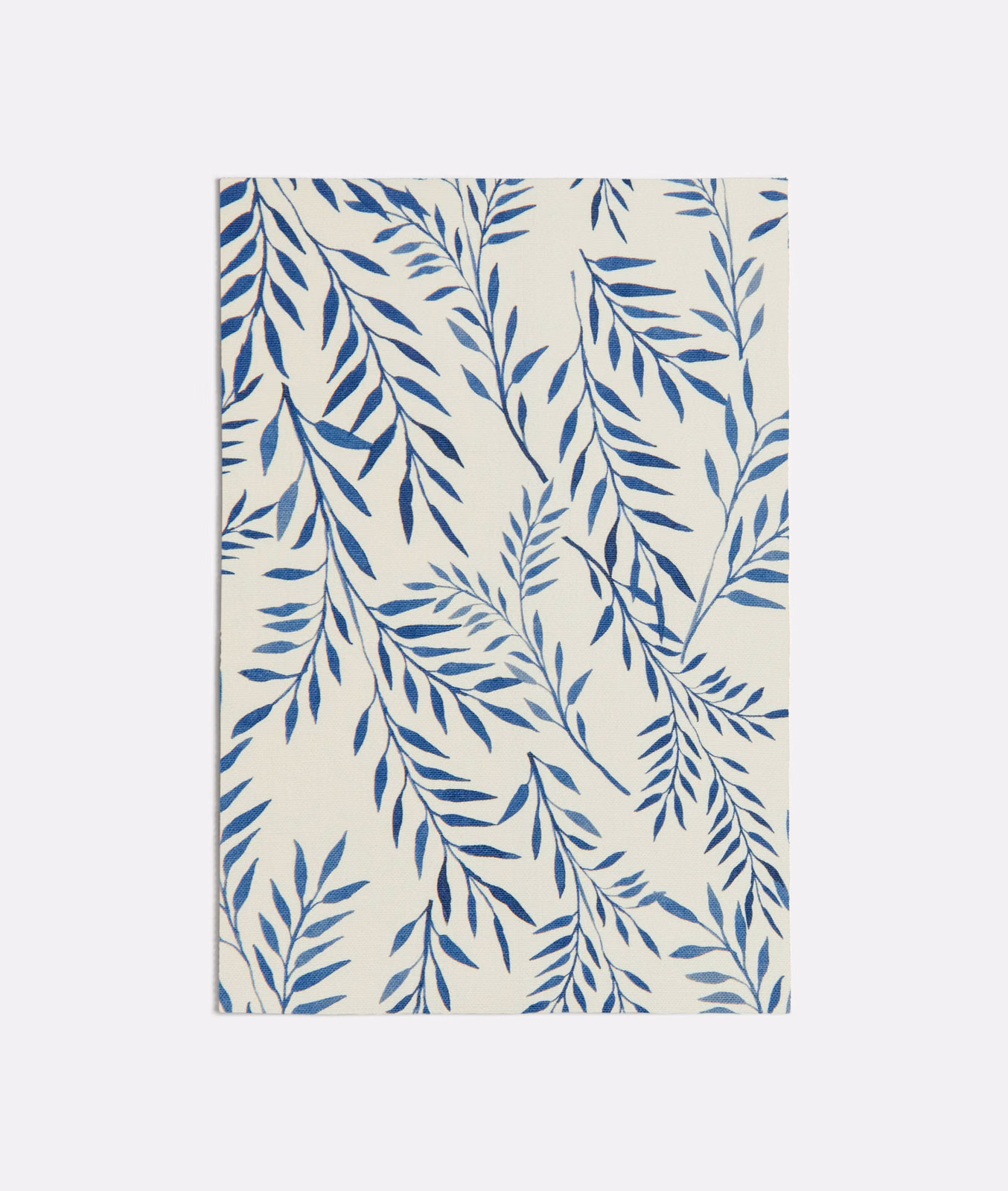 Cream textile with branching ink-blue leafy sprays in a loose vertical repeat