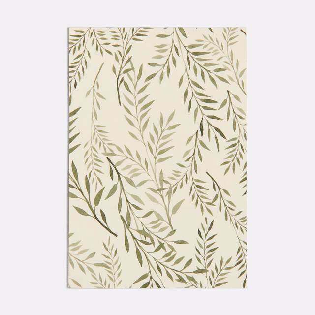 Cream fabric with muted sage and olive-green leafy branches in a loose botanical pattern