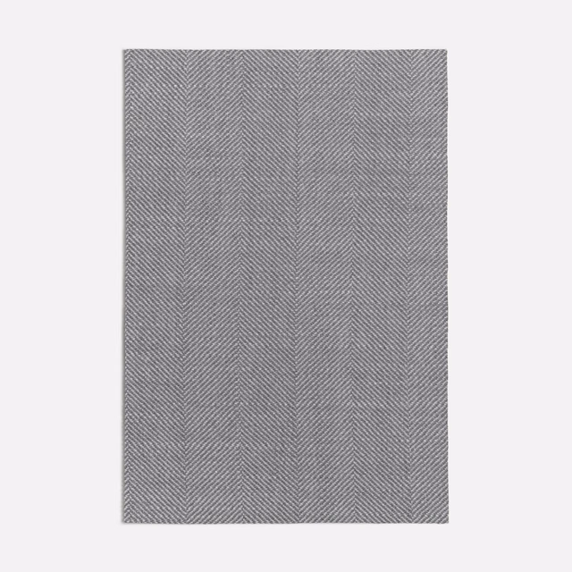 Warm tan-grey woven fabric with fine, closely spaced herringbone stripes