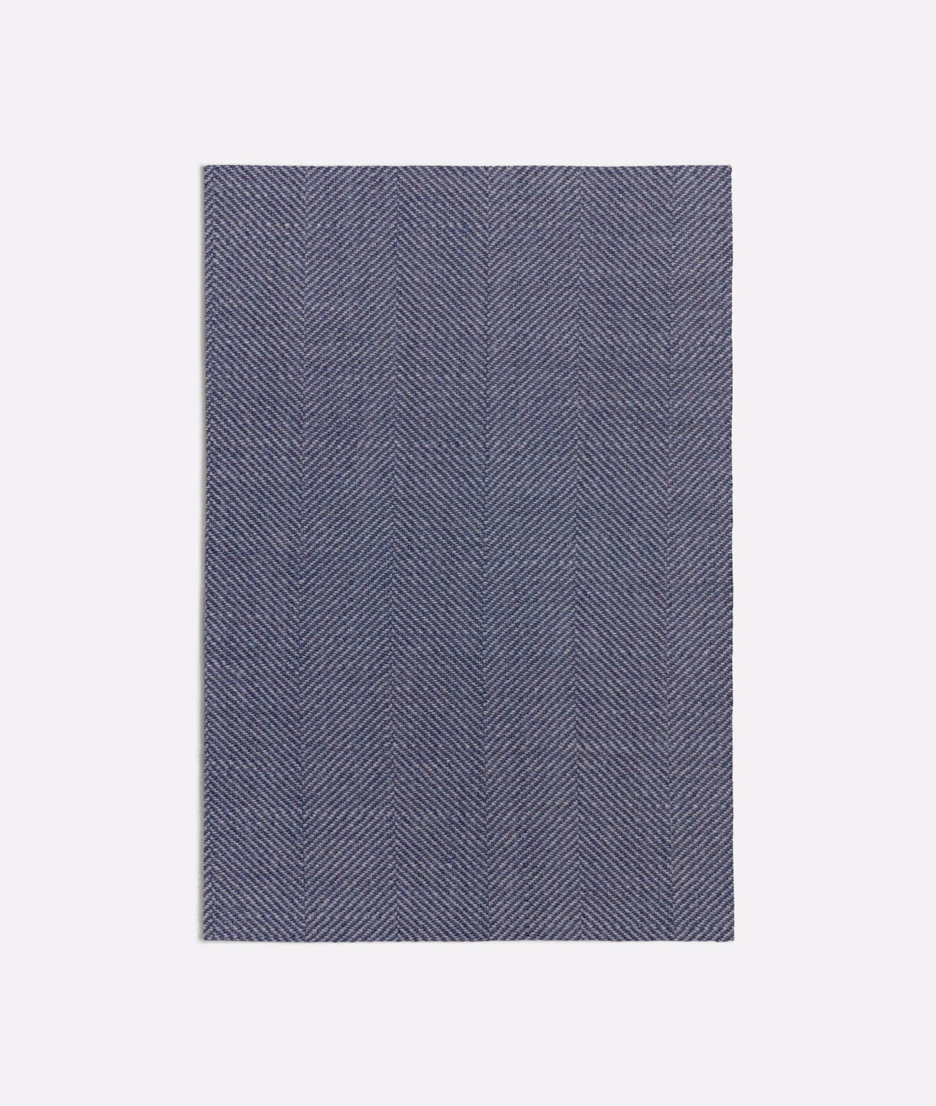 Smoky navy textile swatch with fine vertical slate herringbone columns