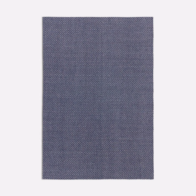 Smoky navy textile swatch with fine vertical slate herringbone columns