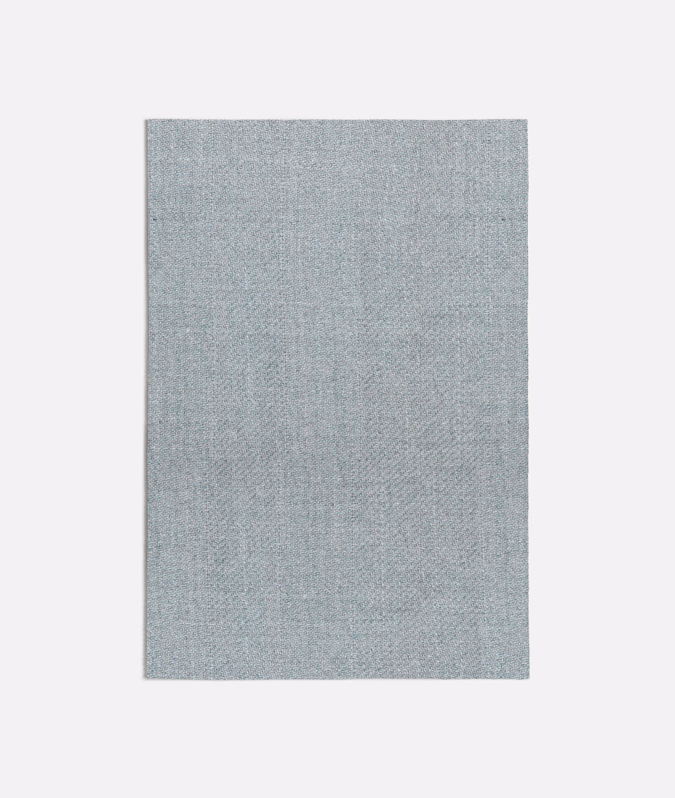 Pale seafoam-grey plain weave with subtle tan flecks and fine texture