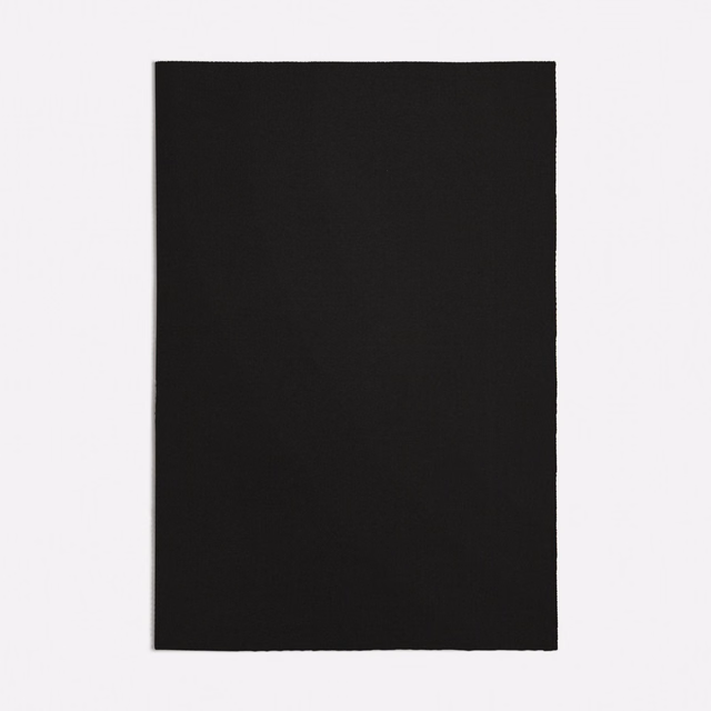 Plain deep black fabric swatch with a subtle matte woven surface