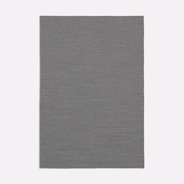 Rectangular grey textile swatch showing fine horizontal woven lines and a softly mottled surface