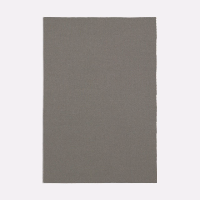 Warm mushroom-grey textile with a fine, softly granular woven surface