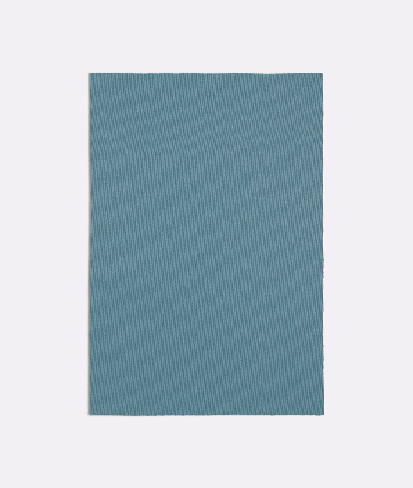 Muted light blue-teal fabric swatch showing a fine, even woven texture