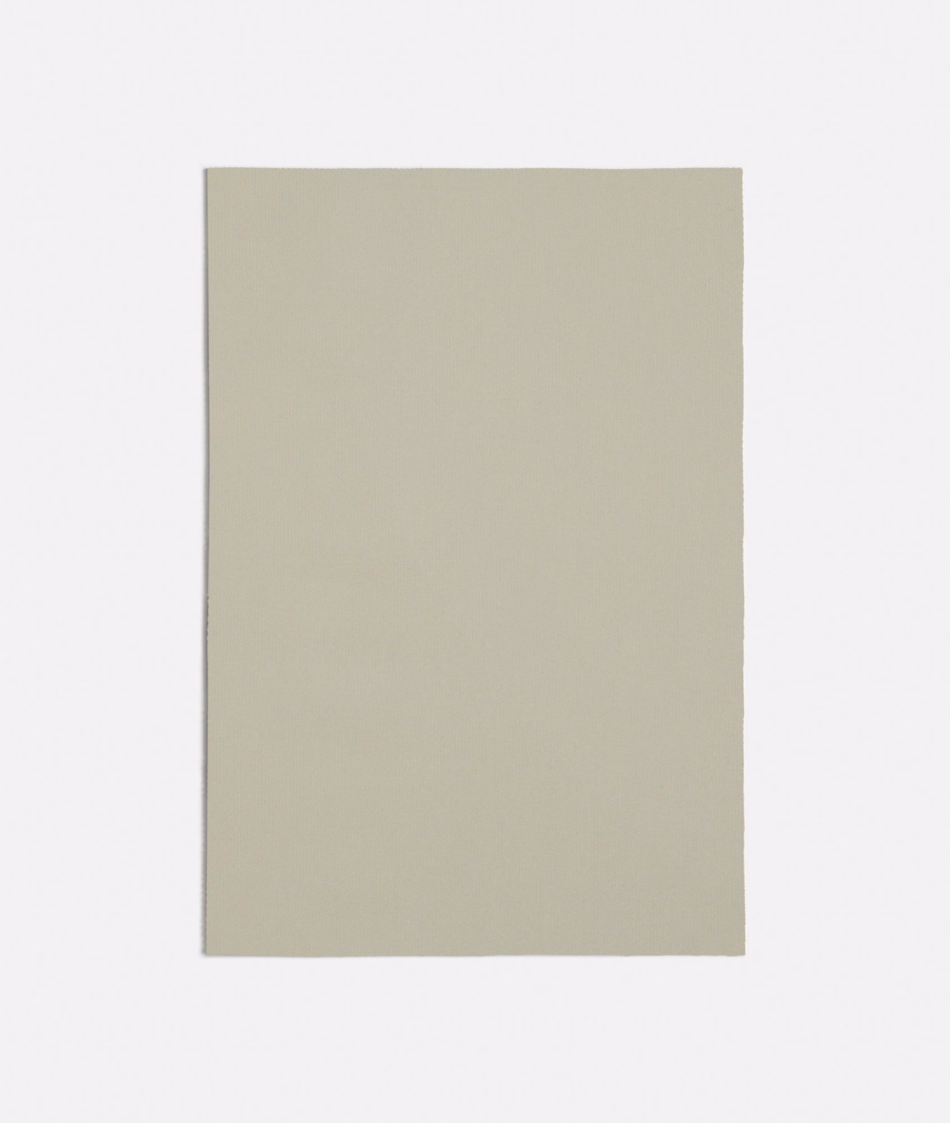 Warm ivory greige swatch with a subtle fine plain weave and matte surface