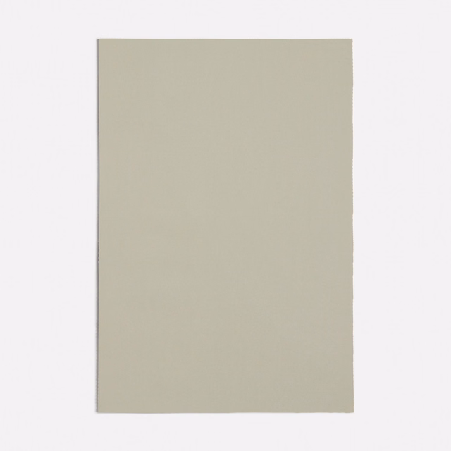 Warm ivory greige swatch with a subtle fine plain weave and matte surface