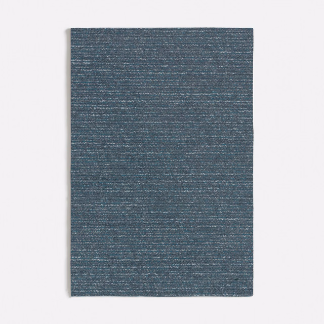 Close view of dark seafoam fabric with fine, horizontal woven texture