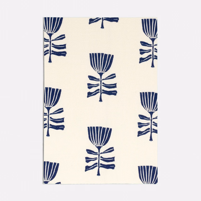 Cream textile with repeated deep navy stylised tulips and striped fan-shaped flower heads
