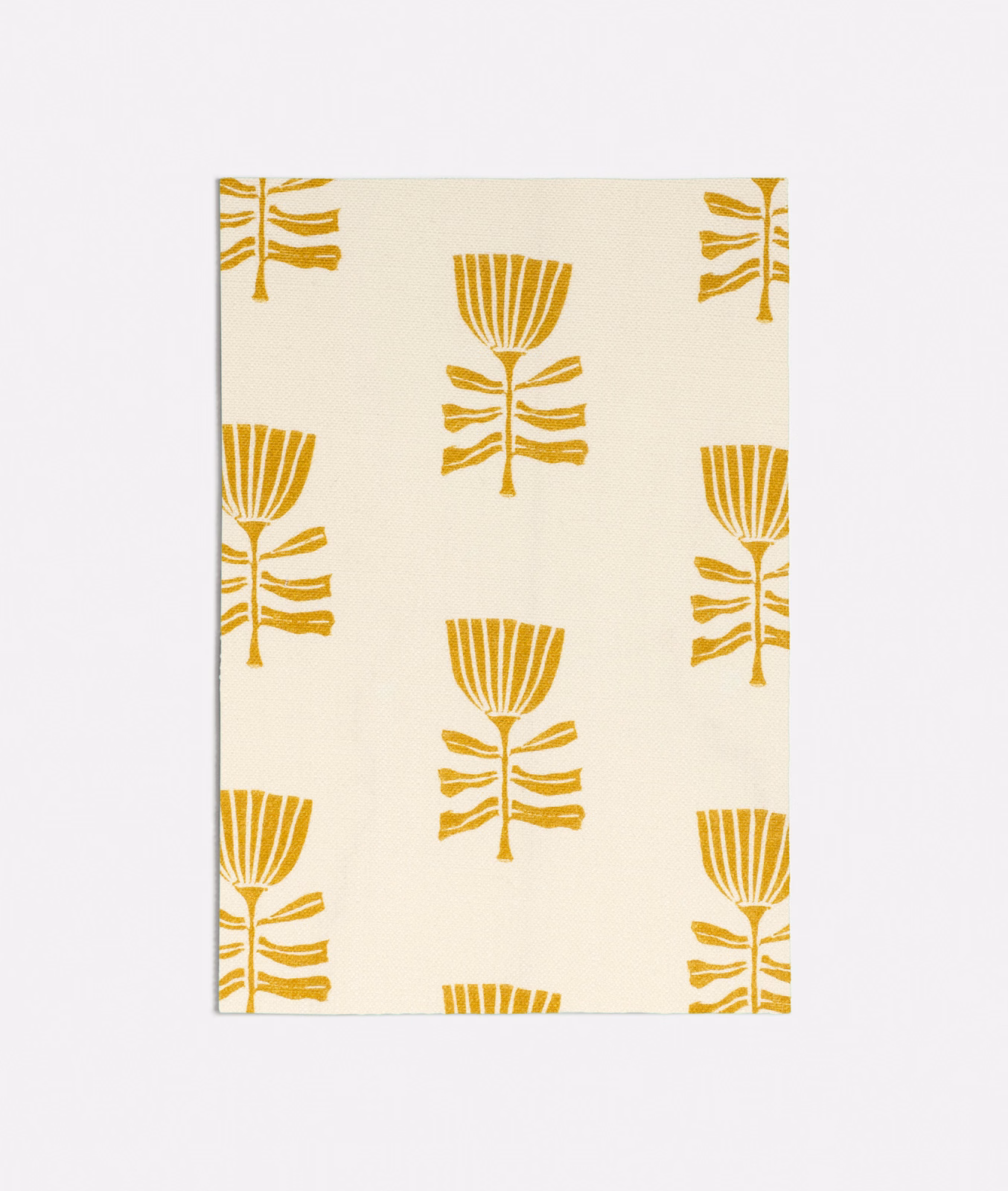 Warm cream fabric with repeating mustard-yellow stylised tulip motifs