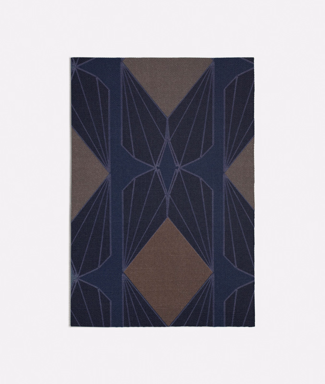 Deep navy geometric fabric with taupe ground and fine angular linework