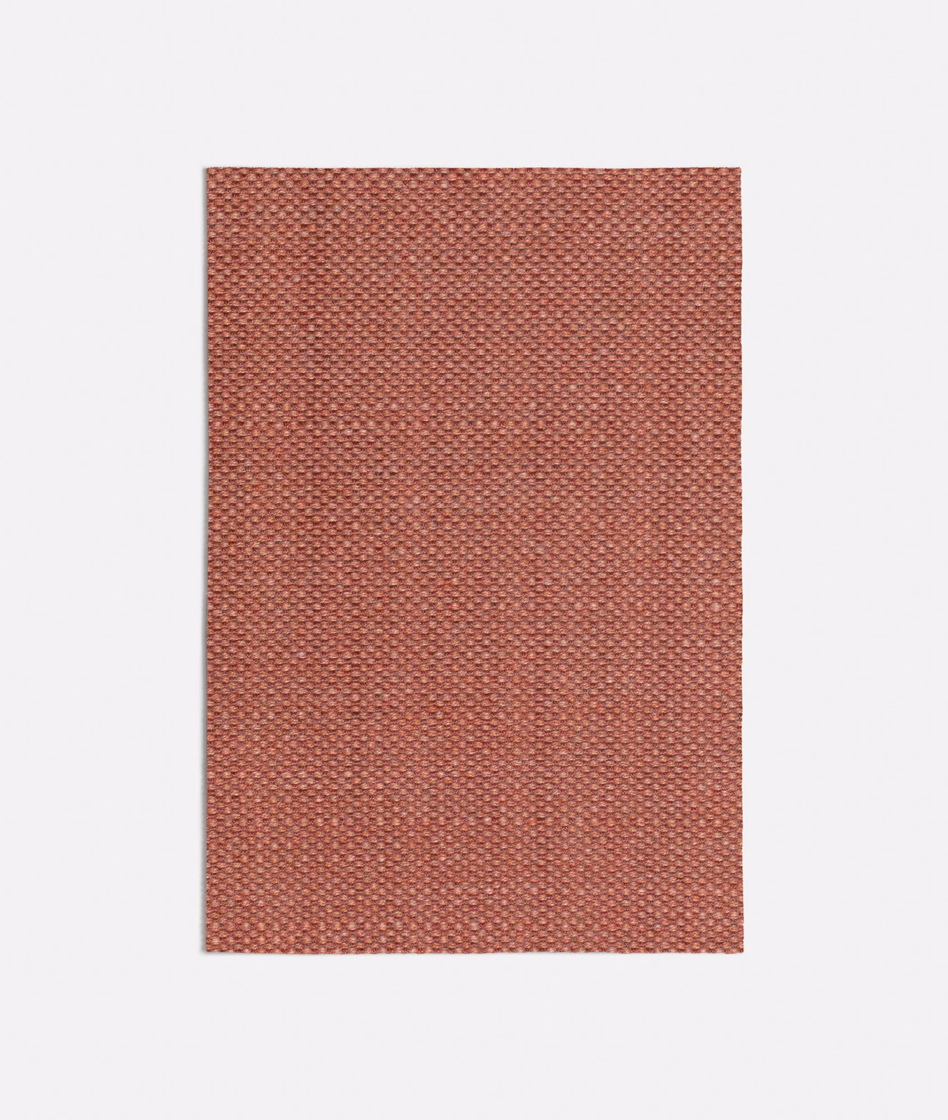 Warm cherry-pink woven swatch with a tiny, evenly spaced crosshatch texture