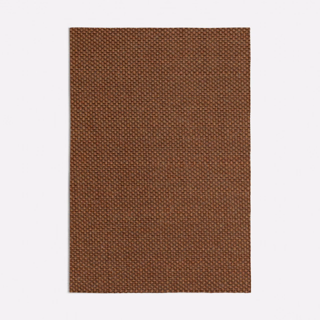 Warm cinnamon-brown swatch with a tiny, tightly patterned woven texture