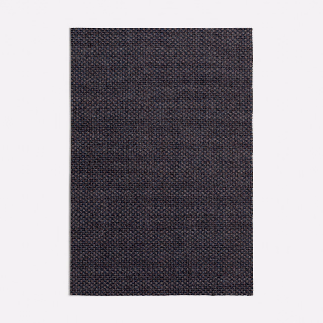 Dark aubergine purple swatch with a fine, densely woven charcoal texture