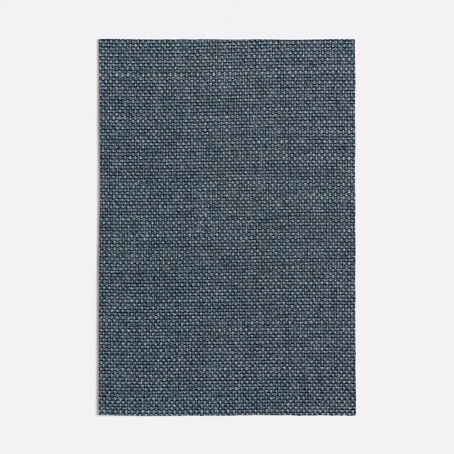 Dark seafoam blue-green fabric with a fine, tactile crosshatched weave