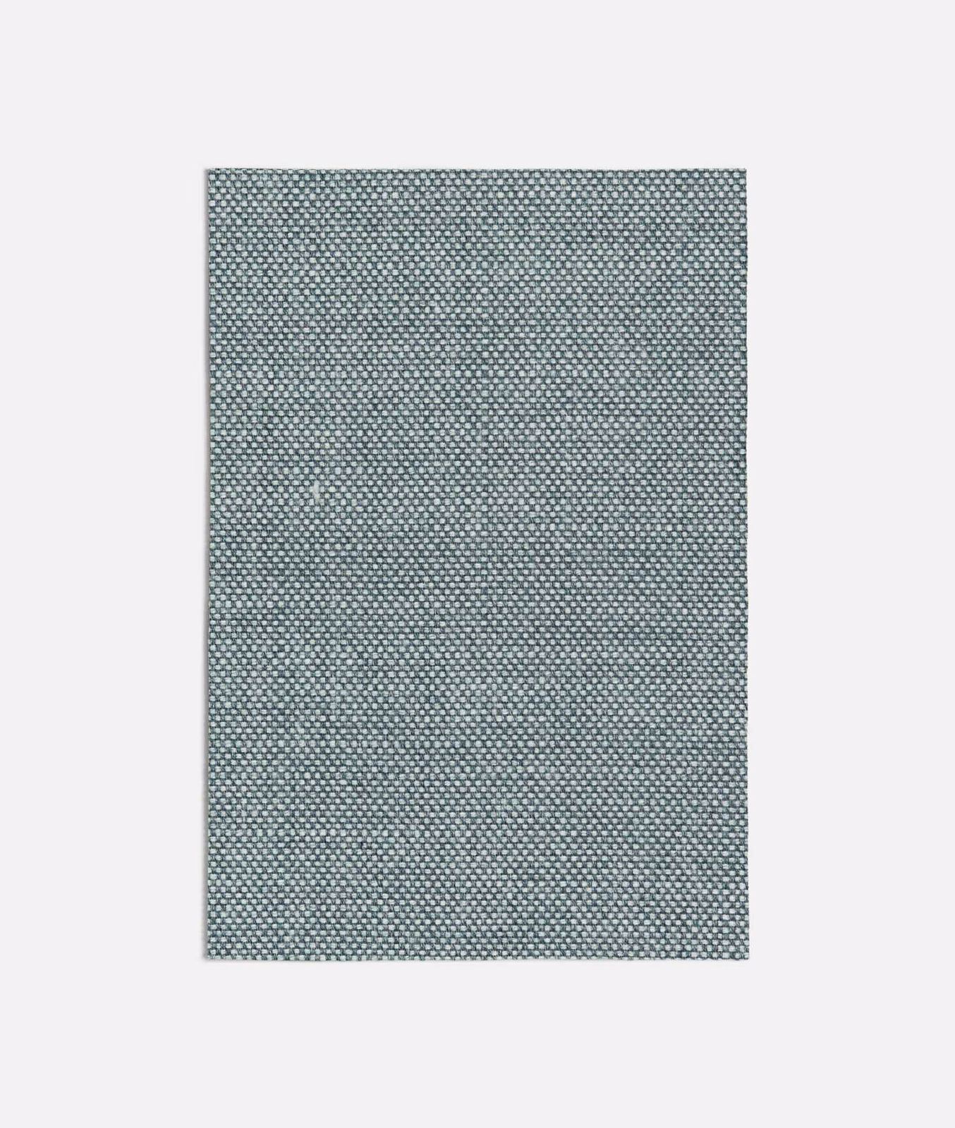 Dark seafoam fabric with dense repeating micro-dot texture and cool grey highlights