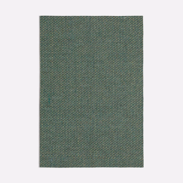 Muted emerald-green woven swatch with fine blue-grey and taupe flecks