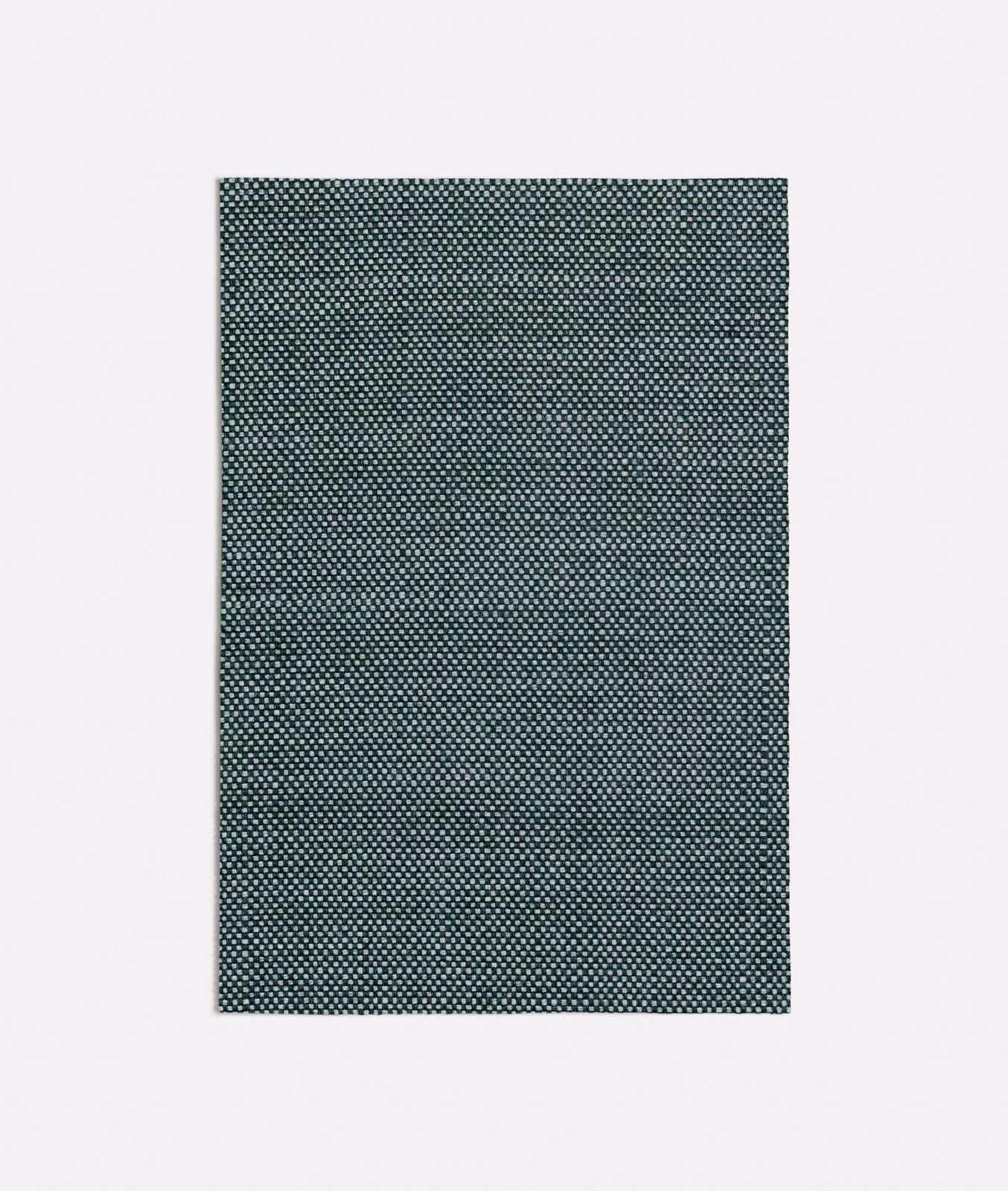 Deep forest green fabric with a tightly woven miniature pale geometric pattern