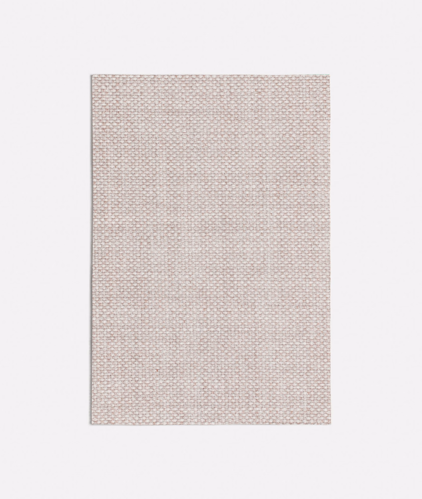 Pale blush pink fabric with a fine beige-toned woven grid texture