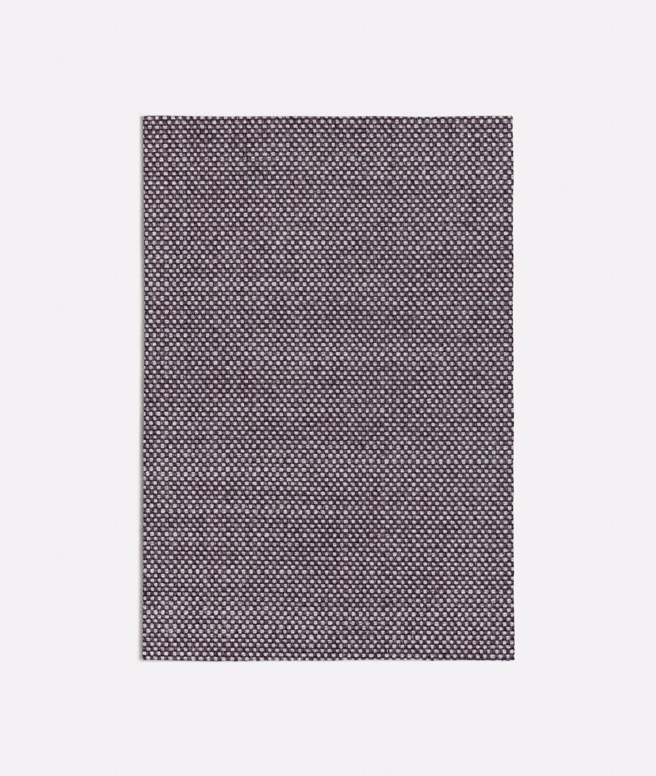 Cool plum-purple woven swatch with a tiny pale geometric peppered texture