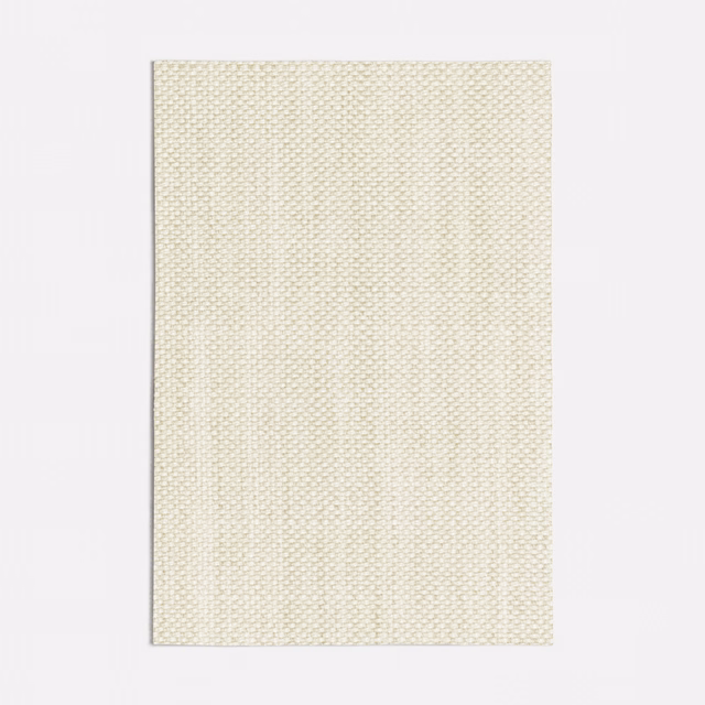 Close view of pale sand fabric with a fine, tightly textured woven surface
