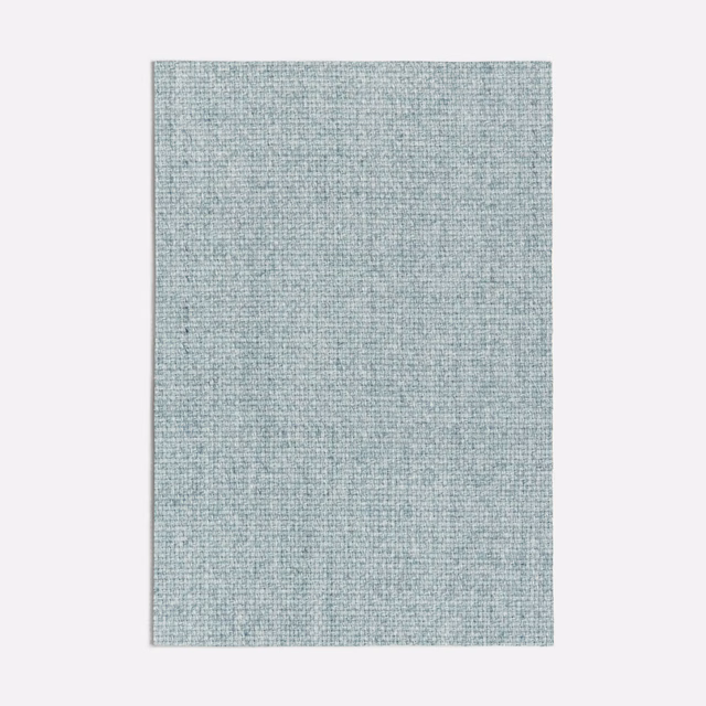 Pale seafoam blue-green fabric swatch with a fine, subtly crosshatched woven texture