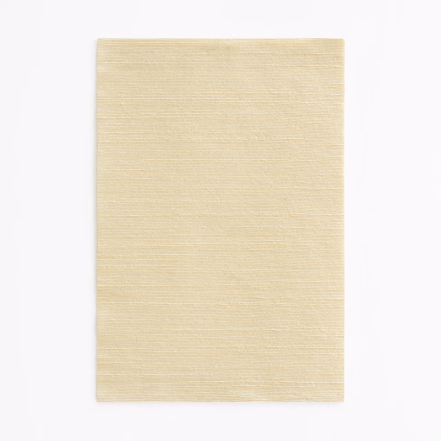 Pale Burro beige textile swatch with fine horizontal texture and soft light-catching surface