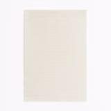 Pale ivory woven swatch with fine horizontal striations and a softly tactile surface