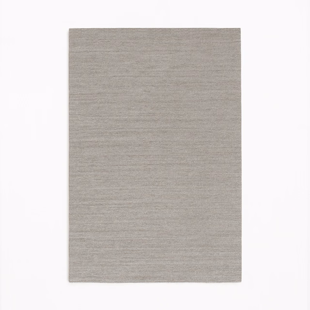 Muted taupe textile swatch with fine horizontal woven texture