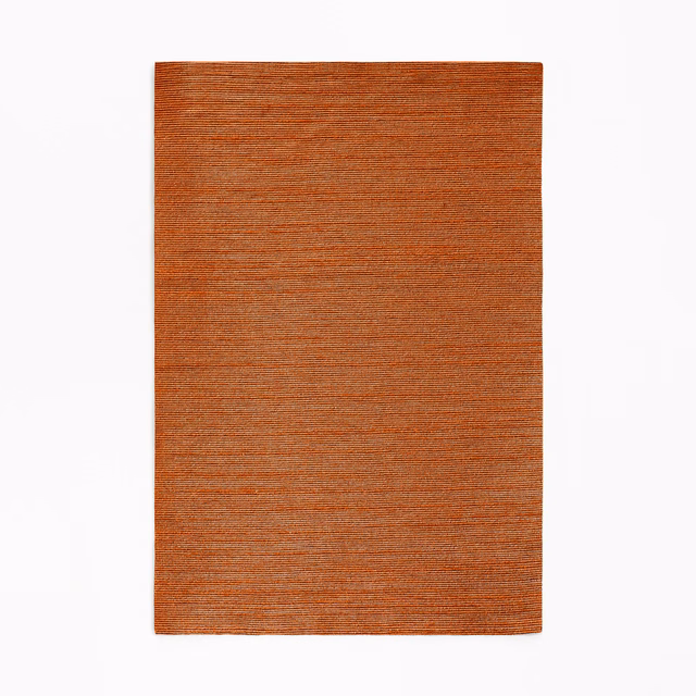 Burnt terracotta woven swatch with fine horizontal striations and subtle tonal depth