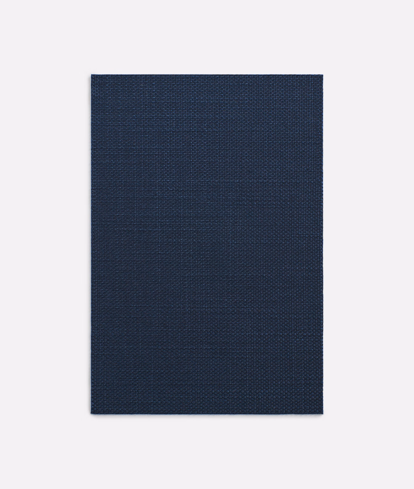 Deep navy Amaretto Notte swatch with a fine, dark crosshatch weave