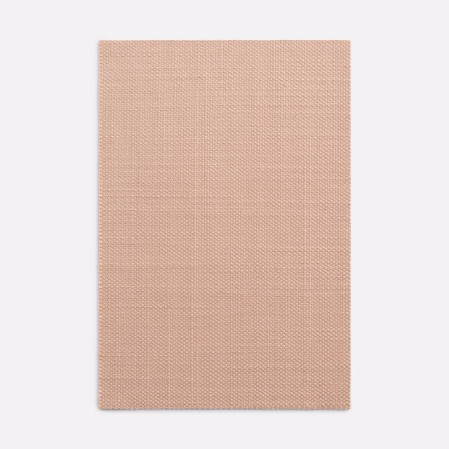 Warm dusty blush-pink swatch with fine pebbled weave and subtle vertical bands