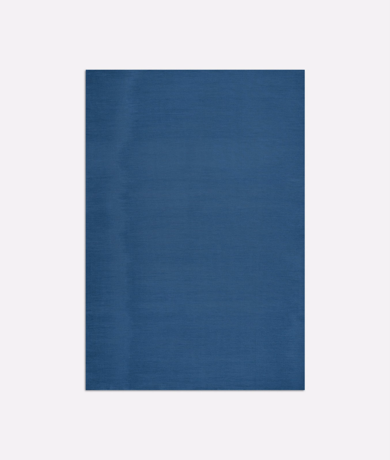 Deep Prussian-blue fabric swatch with subtle horizontal weave and cloudy tonal movement