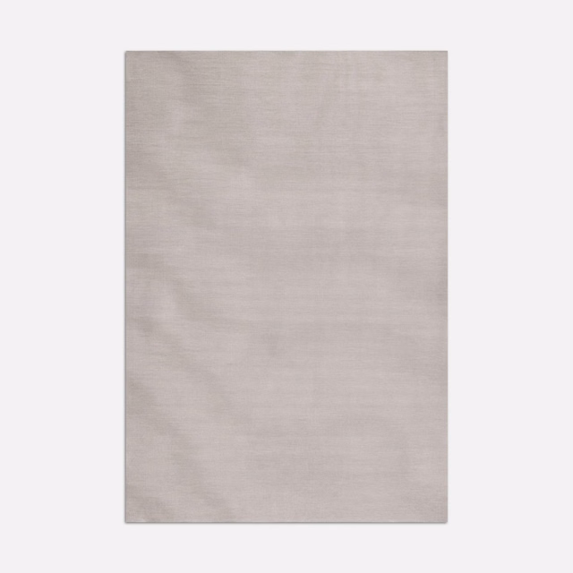 Pale mauve-grey fabric swatch with fine horizontal grain and misted sheen