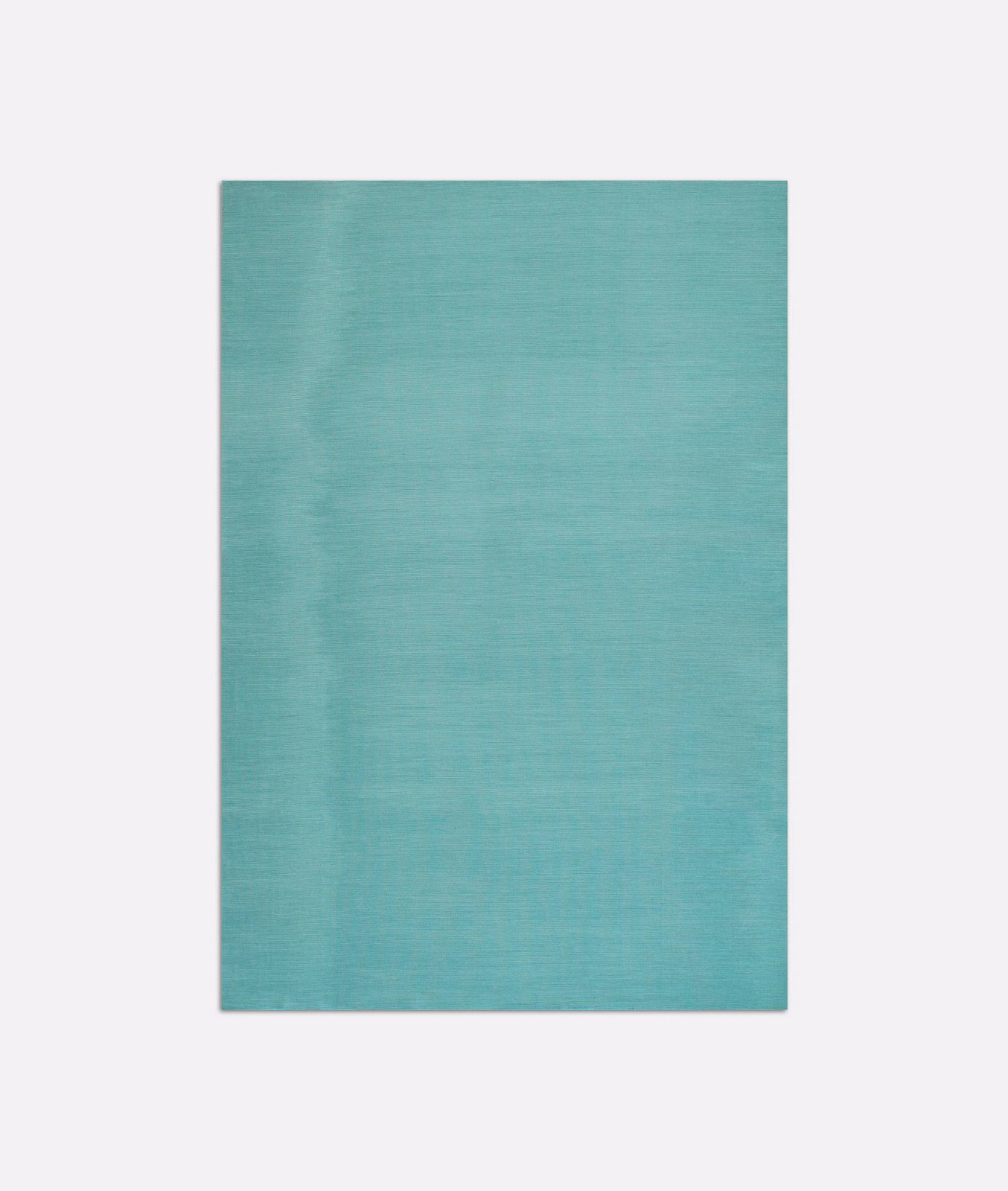 Cool turquoise teal fabric with fine horizontal slub and softly mottled surface