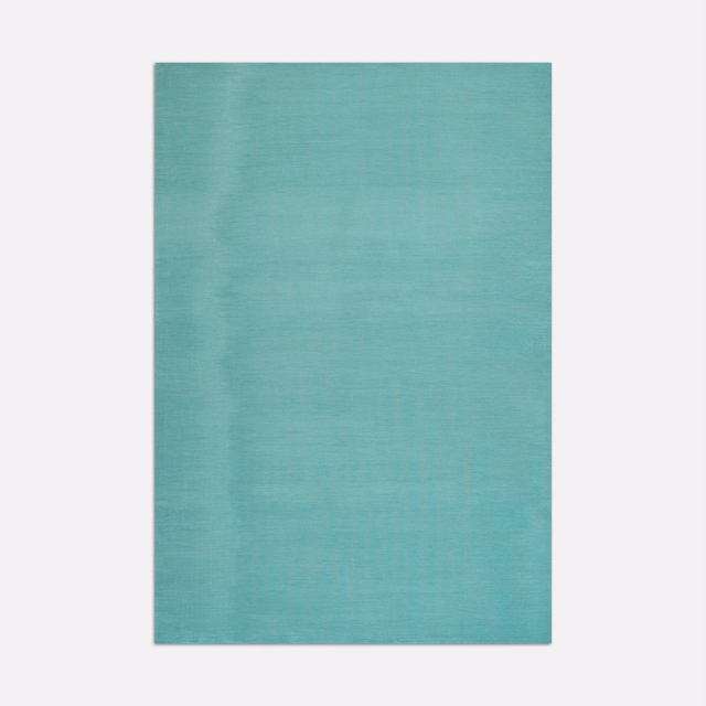Cool turquoise teal fabric with fine horizontal slub and softly mottled surface