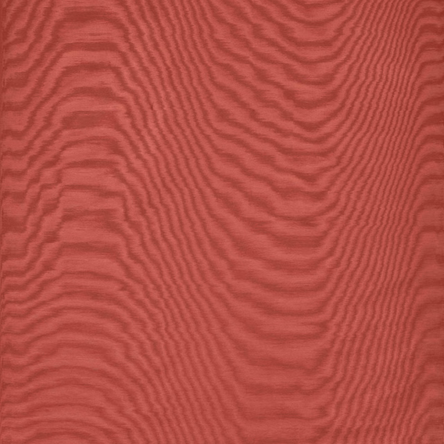 Deep coral-red fabric with flowing darker moiré lines and a softly ridged woven texture
