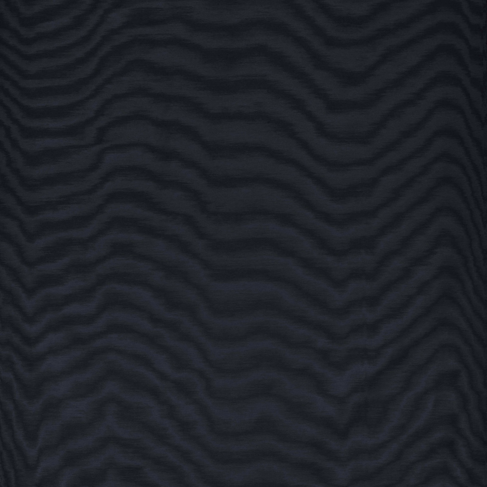 Onyx-black fabric with subtle charcoal undulating wave bands and a softly textured surface