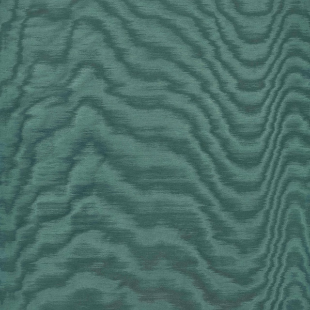 Deep teal-green textile with softly lustrous, irregular woodgrain bands