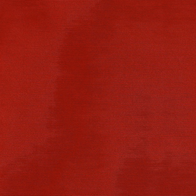 Deep crimson red textile with fine horizontal ribs and softly rippled tonal shading