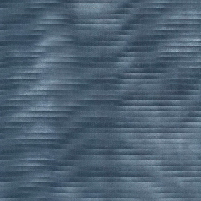 Smoky blue-grey fabric with fine horizontal ribs and softly mottled tonal bands